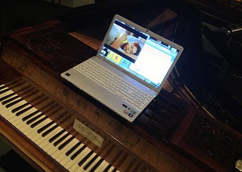 laptop on Broadwood piano